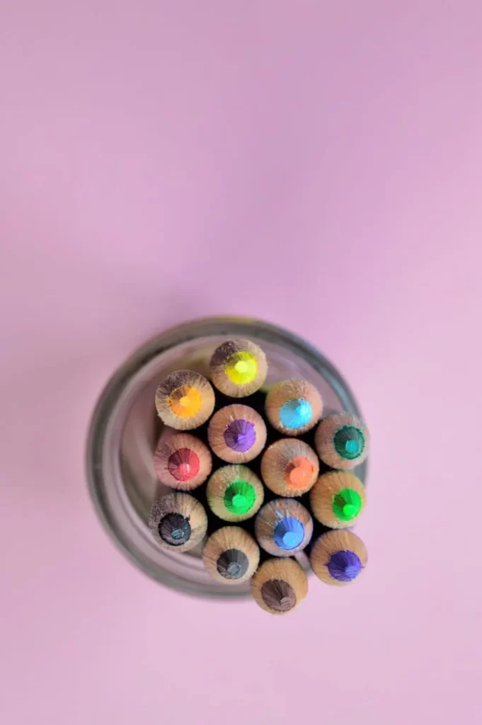 pexels-photo-230514 Colorful pencils in a glass jar from above on a pastel backdrop. Perfect for art and educational themes.